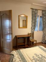 Postel nebo postele na pokoji v ubytování Casa de Fado