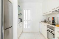 Kuchyň nebo kuchyňský kout v ubytování Apartamento Pink VistaBella Sunrise
