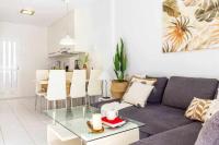 Posezení v ubytování Apartamento Pink VistaBella Sunrise