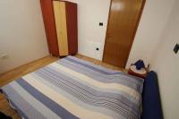 Posteľ alebo postele v izbe v ubytovaní Apartments in Novi Vinodolski 39371