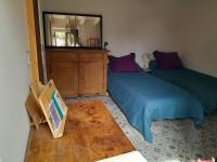 Posteľ alebo postele v izbe v ubytovaní La maison du Caï