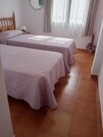 Postel nebo postele na pokoji v ubytování Precioso Apartamento Gran Reserva