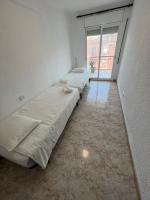 Posteľ alebo postele v izbe v ubytovaní La Carmeta Apartament