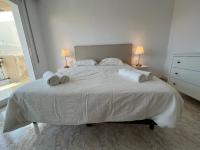 Posteľ alebo postele v izbe v ubytovaní La Carmeta Apartament