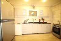 Kuchyň nebo kuchyňský kout v ubytování Sweet home in maadi