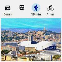 a comparison of a city and a city with different buildings at Charmant appart 4Per Marseille in Marseille