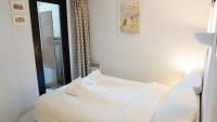 Łóżko lub łóżka w pokoju w obiekcie Appartement 556, Vue Mer et piscine By Palmazur Vacances