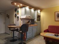 Kuchyň nebo kuchyňský kout v ubytování Ferienwohnung Pillasch 24306 Niede