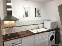 A kitchen or kitchenette at La Tour de Jeanne : Hypercentre charme et design