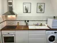 A kitchen or kitchenette at La Tour de Jeanne : Hypercentre charme et design