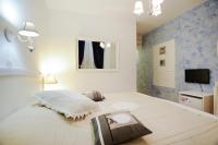 Posteľ alebo postele v izbe v ubytovaní Tinel Rooms Old City Center