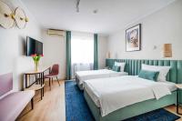 Posteľ alebo postele v izbe v ubytovaní Hotel H12****