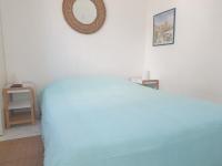 Łóżko lub łóżka w pokoju w obiekcie 3 pièces face mer et St-Tropez