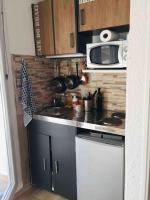 Kuchyňa alebo kuchynka v ubytovaní Nouveau! Studio centre ville avec terrasse vue mer, classé 2 étoiles