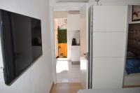 TV a/nebo společenská místnost v ubytování Vialia Apartments