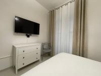 A television and/or entertainment centre at Case Baldelli La Chiostrina
