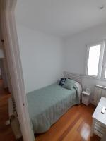 Łóżko lub łóżka w pokoju w obiekcie LA MARINA amplio apartamento en pleno centro de Hondarribia