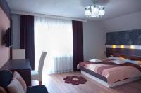 Posteľ alebo postele v izbe v ubytovaní Guesthouse Villa Plitvička
