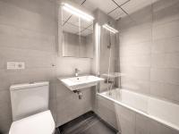 A bathroom at New beach front apartment with large balcony