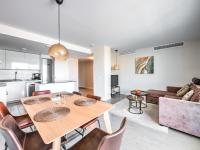 A kitchen or kitchenette at New beach front apartment with large balcony