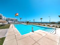The swimming pool at or close to New beach front apartment with large balcony