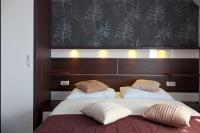 Posteľ alebo postele v izbe v ubytovaní Guesthouse Villa Plitvička
