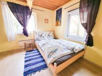 Posteľ alebo postele v izbe v ubytovaní Ruhige Wohnung mit schönem Eigengarten in Seeboden am Millstättersee