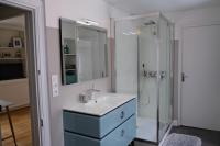 a bathroom with a sink and a shower at Contes à Rebours - Chambres d&#39;hôtes in Morlaix