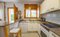 Kuchyň nebo kuchyňský kout v ubytování Chalet Marisol Riumar Pura Natura