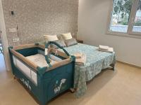 Posteľ alebo postele v izbe v ubytovaní CASA VACACIONAL MÁLAGA 14 Chalet
