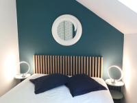 Cama ou camas em um quarto em Les cottages du golf &agrave; Ploemel