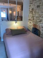 Łóżko lub łóżka w pokoju w obiekcie Appartement centre ville Quimper avec terrasse