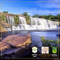 a picture of a waterfall in the jungle at POUSADA VILA ACONCHEGO- Sossego- Em Meio Há Mata Nativa- by MARCOS MICOZZI in Serra do Cipo