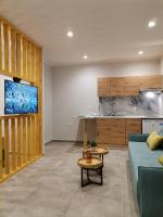 TV a/nebo společenská místnost v ubytování Sea Salt Apartments