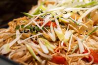a plate of food with noodles and vegetables at C-One Resort Jaeundo in Sinan