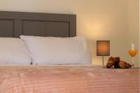 A bed or beds in a room at Luxury apartment puerto marina los alcazares