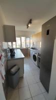 Kuchnia lub aneks kuchenny w obiekcie Appartement lumineux et central