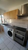 Kuchnia lub aneks kuchenny w obiekcie Appartement lumineux et central