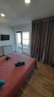 Łóżko lub łóżka w pokoju w obiekcie Appartement lumineux et central