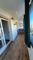 Telewizja i/lub zestaw kina domowego w obiekcie Appartement lumineux et central