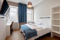 Postel nebo postele na pokoji v ubytování Hotel Traffic Poznań Stare Miasto