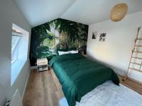 Posteľ alebo postele v izbe v ubytovaní Voyage en Duplex en Hyper Centre