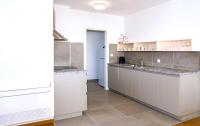 Kuchyňa alebo kuchynka v ubytovaní Rivus Apartments