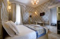 Posteľ alebo postele v izbe v ubytovaní Hotel Canaletto
