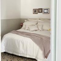 A bed or beds in a room at Camaredde N. 10