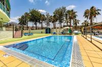 Bazén v ubytování Modern apartment in Las Americas nebo v jeho okolí