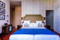 Postel nebo postele na pokoji v ubytování Boutique Hotel Cordial Plaza Mayor de Santa Ana