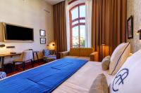 Postel nebo postele na pokoji v ubytování Boutique Hotel Cordial Plaza Mayor de Santa Ana