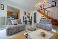 Część wypoczynkowa w obiekcie Imagine - Charmante maison avec jardin