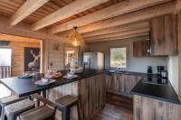 Kuchnia lub aneks kuchenny w obiekcie Luxueux chalet avec vue sur les pistes et le Hohneck